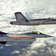 The prototype YF-16 flies in formation with the prototype YF-17 during the competition to select a new lightweight fighter for the US Air Force